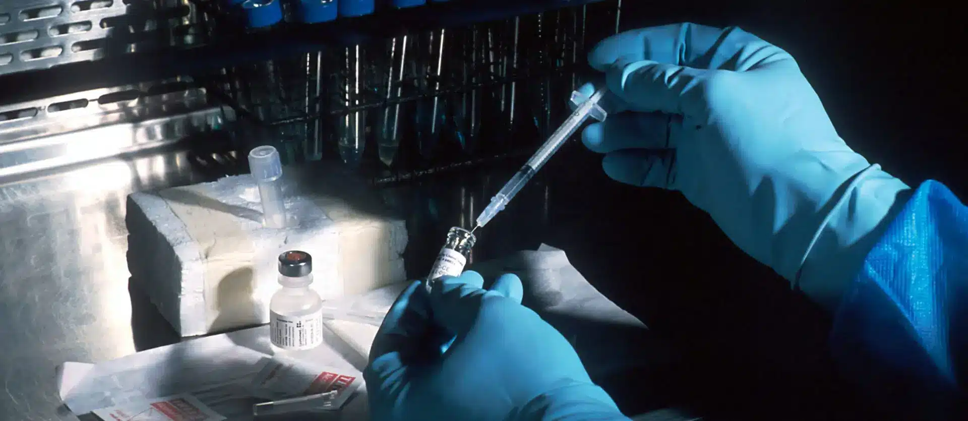 image of researcher Looking at flask